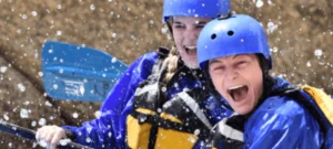 People whitewater rafting