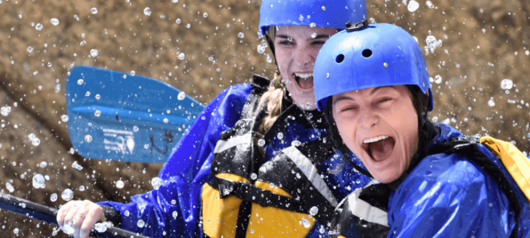 People whitewater rafting